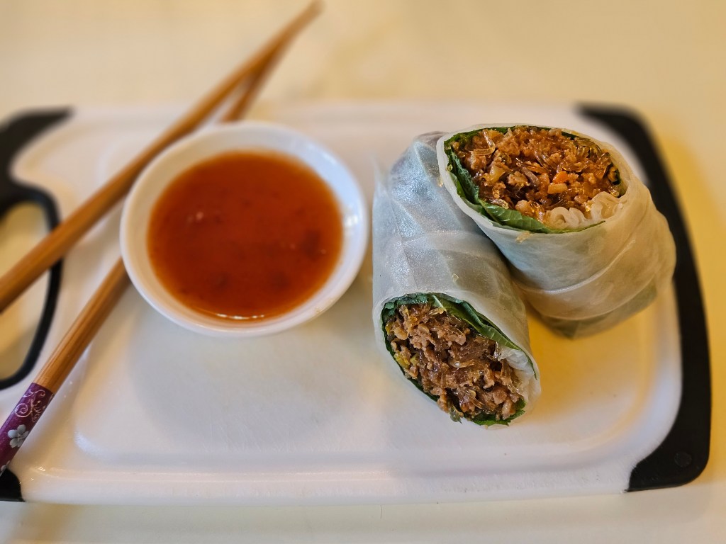 Exploring the Perfect Harmony: Pork and Parilla Leaf Cold Spring Rolls with Sriracha Plum&nbsp;Sauce